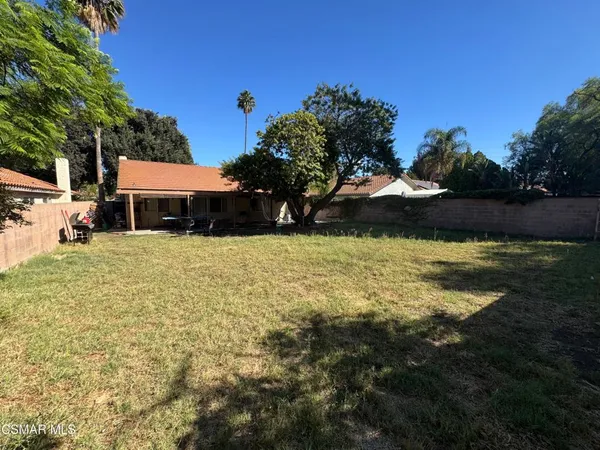 a view of swimming pool with seating space