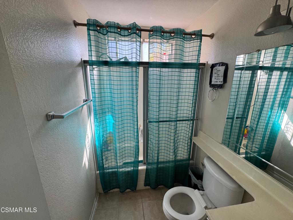 1459 Willowbrook Lane Simi Valley, CA 93065 - Photo 28 of 29 a bathroom with a sink toilet and shower