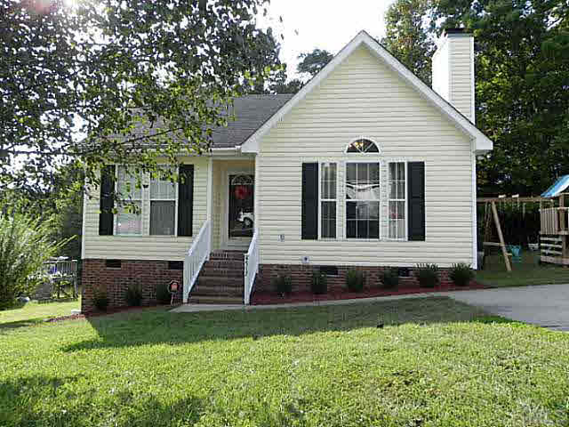 4517 Whistling Way Raleigh, NC 27616 - Photo 1 of 24 a view of a house with a yard