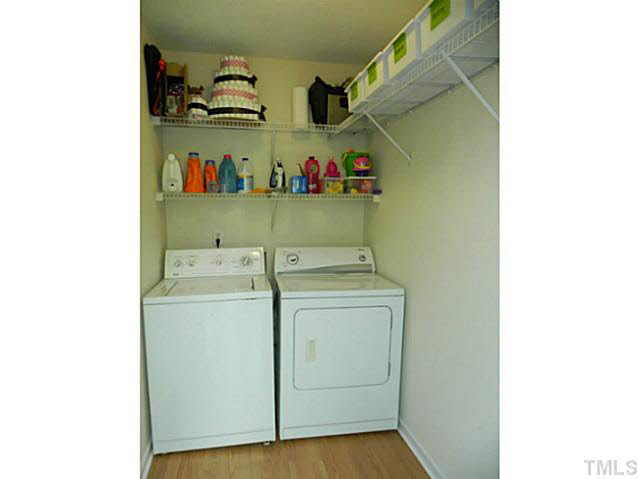 4517 Whistling Way Raleigh, NC 27616 - Photo 21 of 24 a utility room with dryer and washer