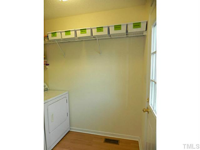 4517 Whistling Way Raleigh, NC 27616 - Photo 22 of 24 a view of door and an empty room