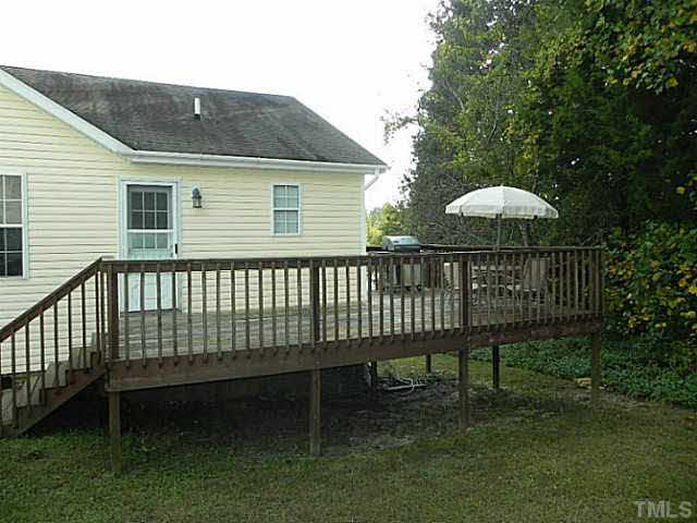 4517 Whistling Way Raleigh, NC 27616 - Photo 23 of 24 a view of a house with a deck