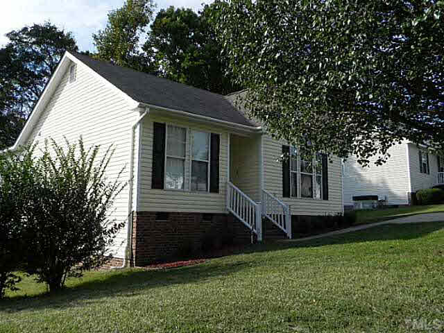 4517 Whistling Way Raleigh, NC 27616 - Photo 24 of 24 a view of a house with a yard