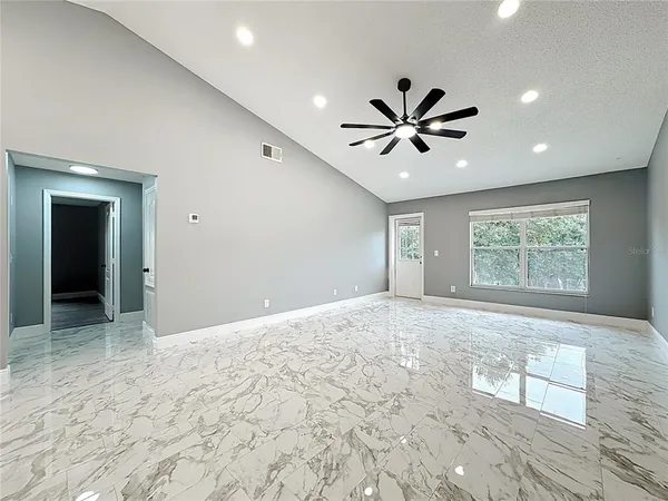 a bathroom with a shower and a sink