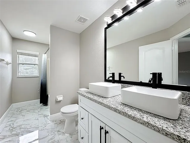 $550,000 | 697 Winding Lake Drive, Clermont, FL 34711