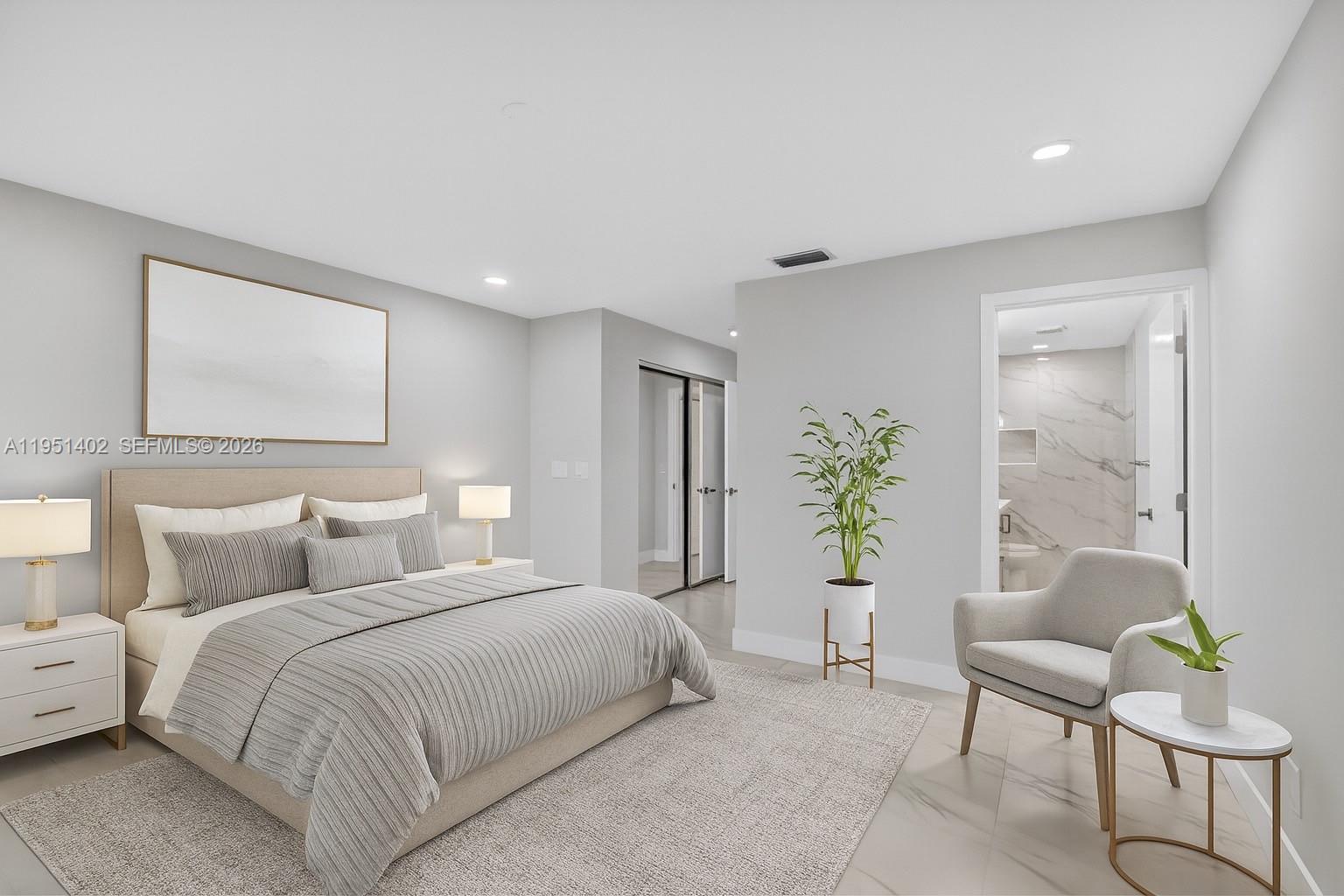 8127 Songbird Terrace Boca Raton, FL 33496 - Photo 3 of 65 a bedroom with a bed and chair