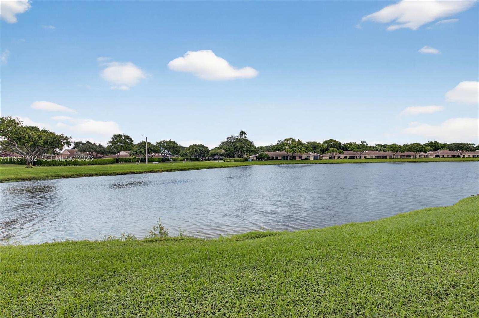 8127 Songbird Terrace Boca Raton, FL 33496 - Photo 35 of 65 a view of a lake