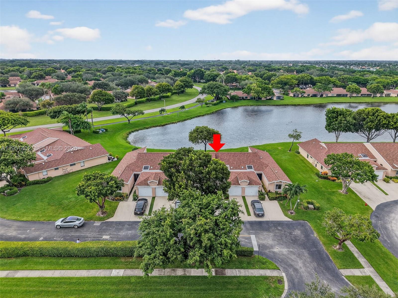 8127 Songbird Terrace Boca Raton, FL 33496 - Photo 44 of 65 an aerial view of a houses with outdoor space and river view