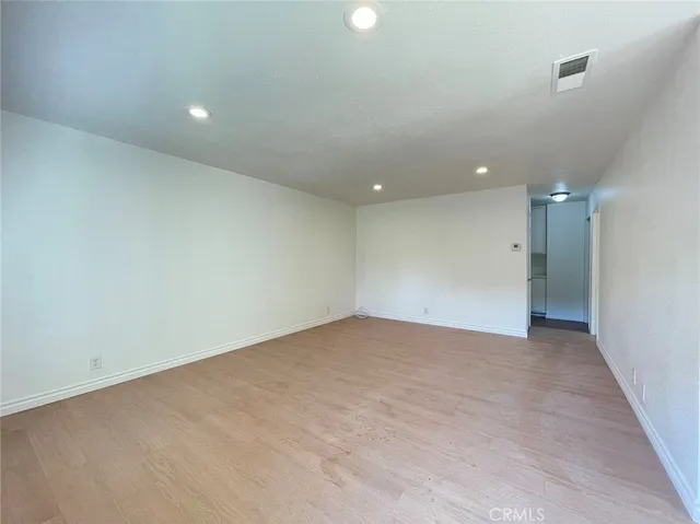 an empty room with an entryway