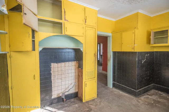 a bathroom with a sink a toilet and bathtub