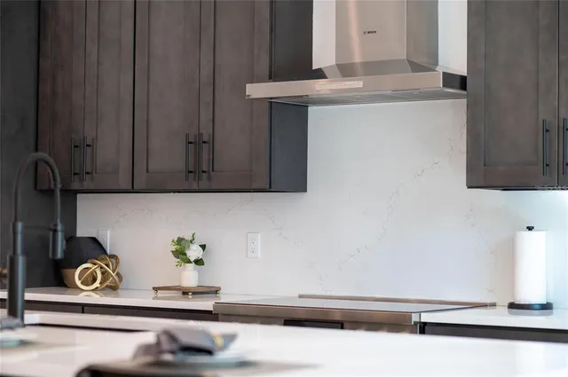 a bedroom with a bed and a lamp