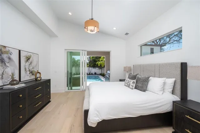 a bathroom with a double vanity sink toilet and shower