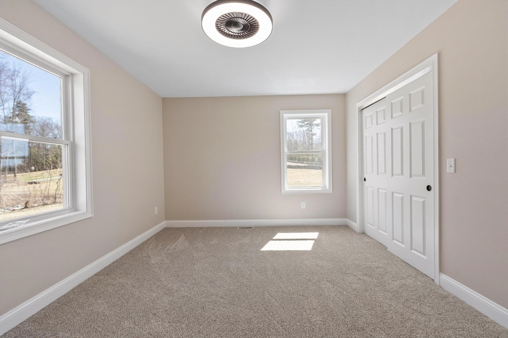 497 Ridge Road Athol, MA 01331 - Photo 32 of 38 an empty room with windows