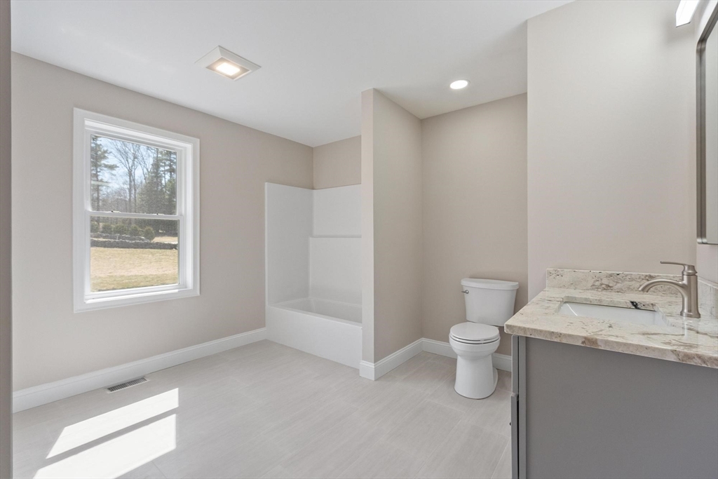 497 Ridge Road Athol, MA 01331 - Photo 33 of 38 a bathroom with a sink and a toilet