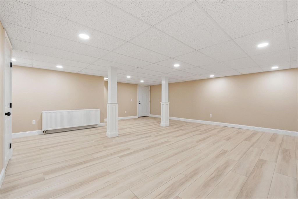 497 Ridge Road Athol, MA 01331 - Photo 36 of 38 a view of an empty room with wooden floor