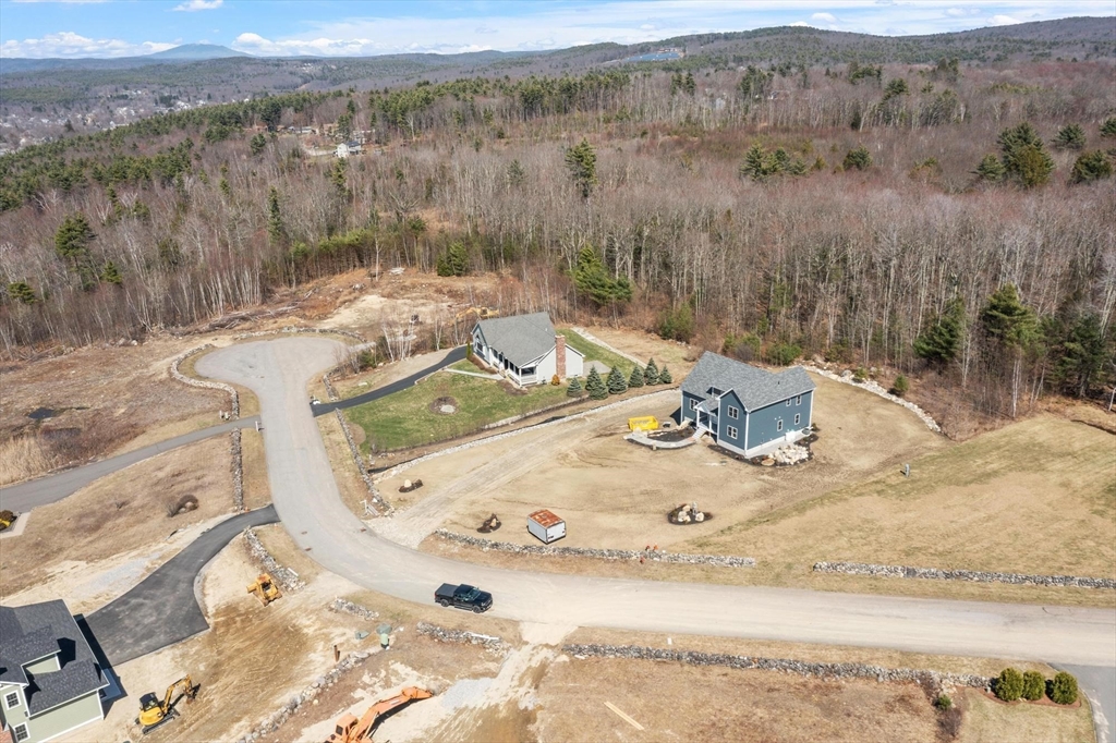497 Ridge Road Athol, MA 01331 - Photo 4 of 38 a view of a backyard with table and chairs