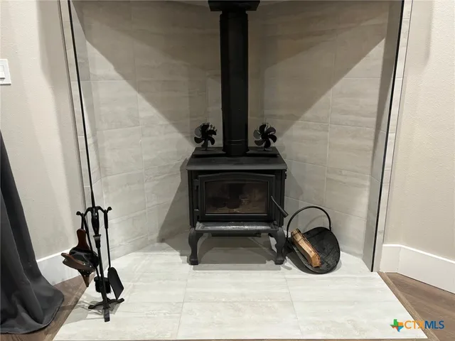 a view of walk in closet with wooden floor