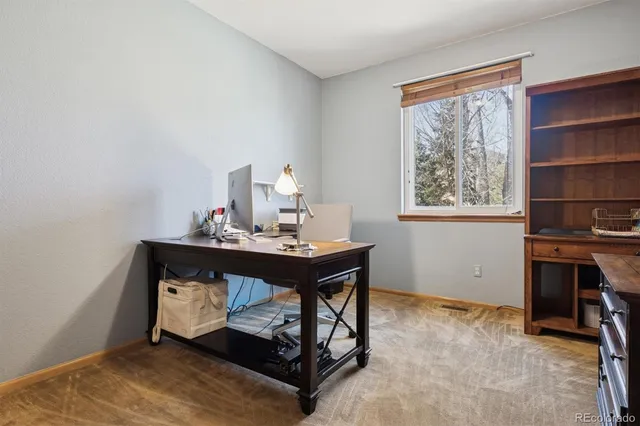 a room with furniture and window