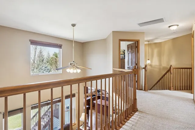 a bed room with bed and window