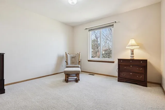 a view of a workspace with furniture