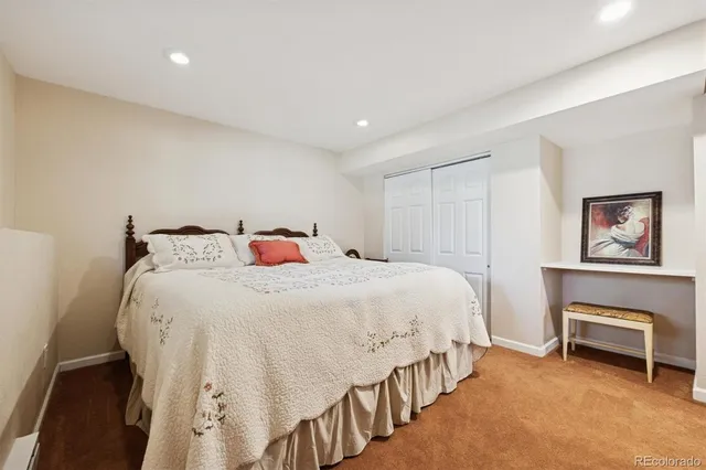 a bathroom with a toilet sink and shower
