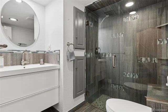 a balcony with wooden floor in front of it