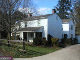 2287 South Valley Road Berwyn, PA 19312 - Photo 2 of 6 a front view of a house with a yard