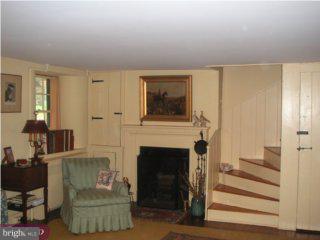 2287 South Valley Road Berwyn, PA 19312 - Photo 3 of 6 a living room with furniture and a fireplace