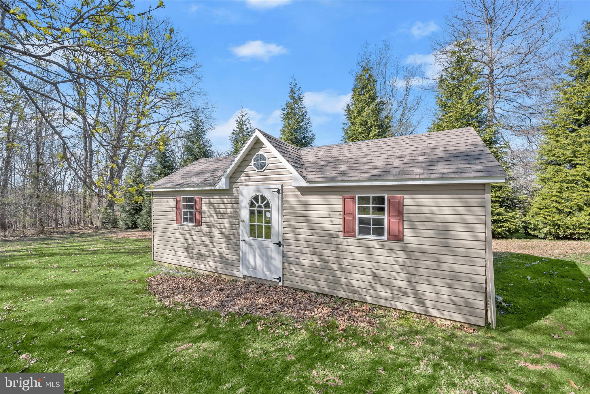 14865 Bushy Park Road Cooksville, MD 21723 - Photo 30 of 39 a view of a yard in front of a house with plants and large tree