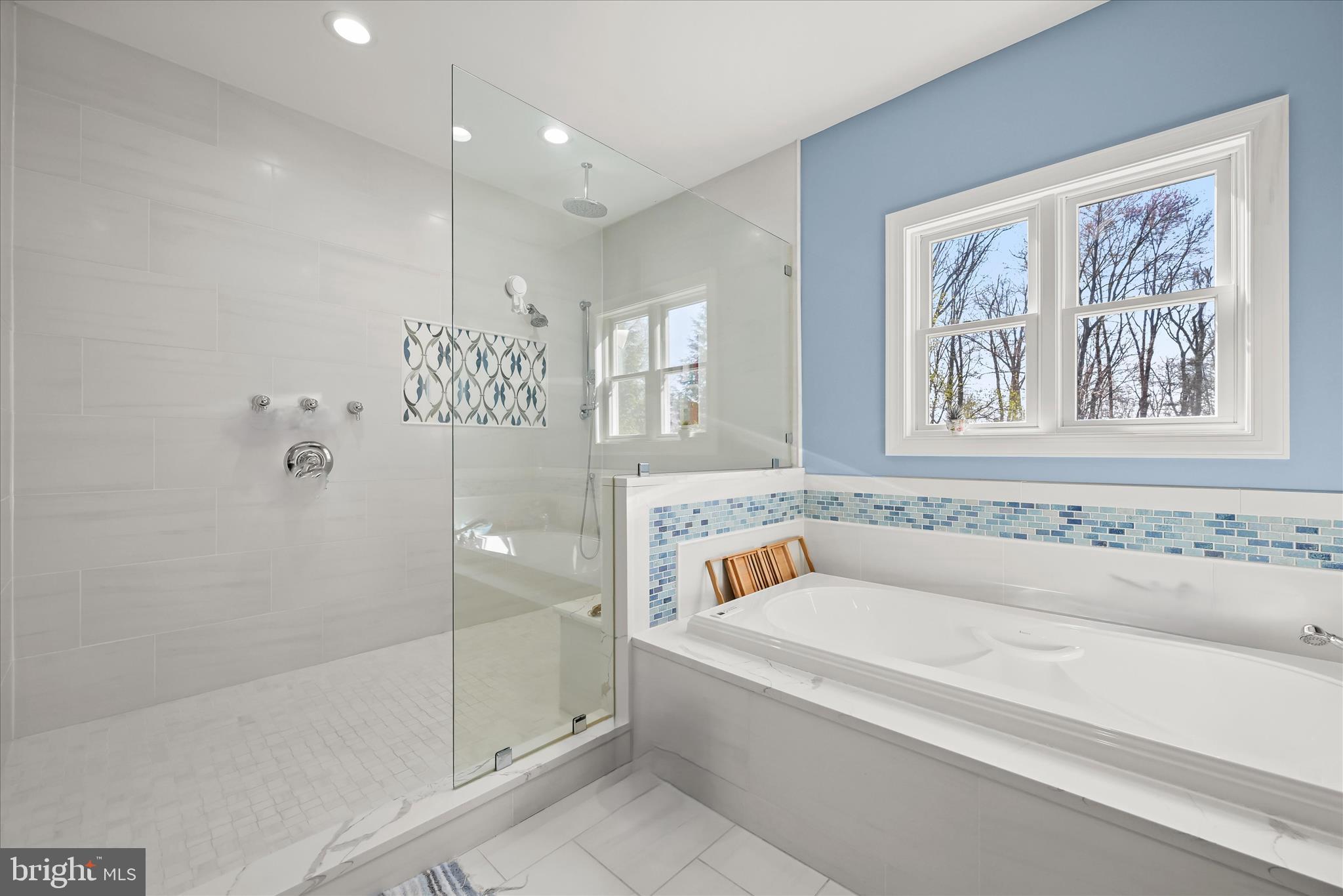 14865 Bushy Park Road Cooksville, MD 21723 - Photo 9 of 39 a bathroom with a bathtub and shower