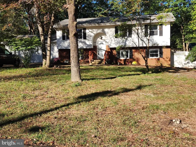 front view of house with a yard