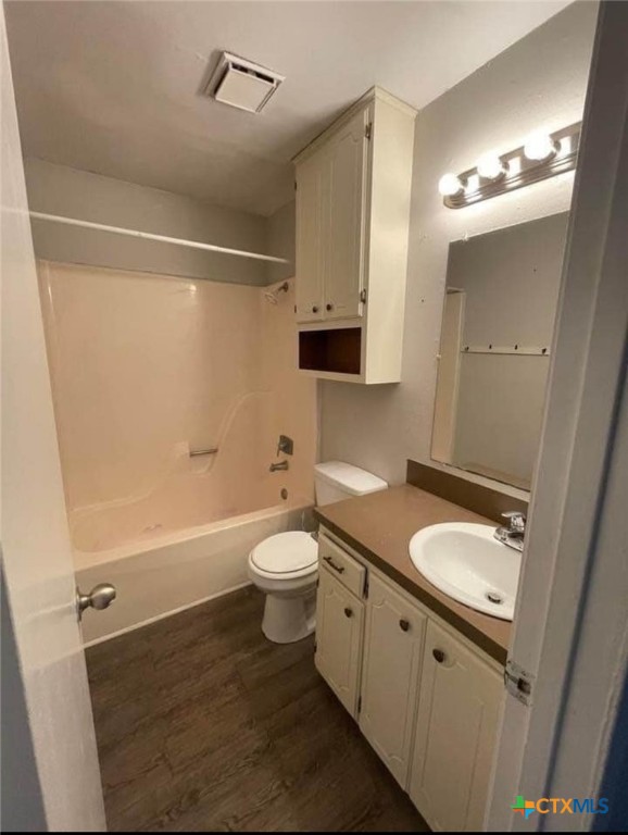 131 Regency Avenue Victoria, TX 77904 - Photo 16 of 16 a bathroom with a granite countertop sink toilet a mirror and shower