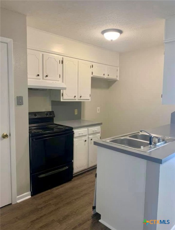 131 Regency Avenue Victoria, TX 77904 - Photo 7 of 16 a kitchen with a sink stove and cabinets
