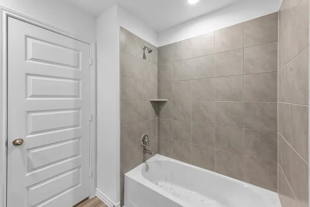 a bathroom with a bathtub