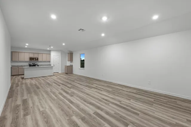a view of kitchen and windows