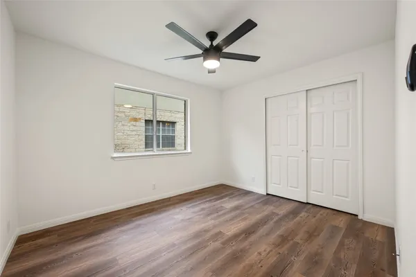 a view of a house with yard and a garden