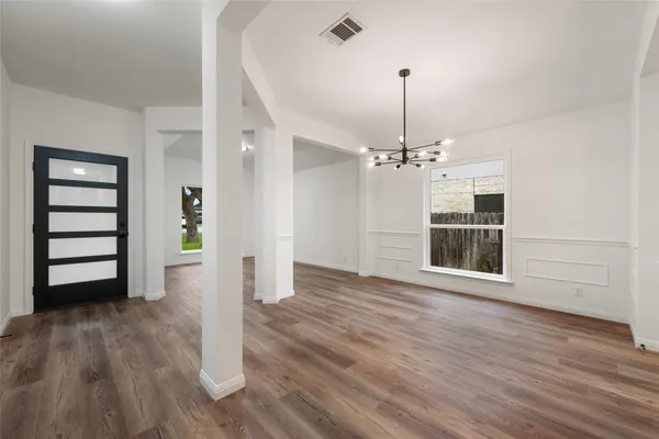 an empty room with windows