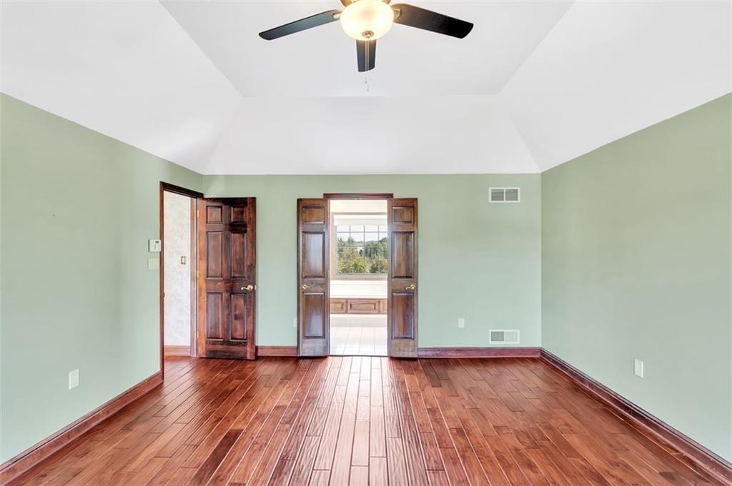 117 Olde Manor Lane Coraopolis, PA 15108 - Photo 13 of 23 wooden floor in an empty room with a window