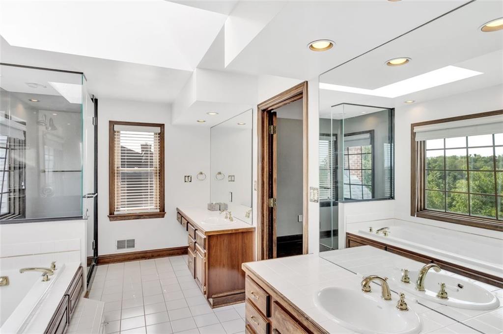 117 Olde Manor Lane Coraopolis, PA 15108 - Photo 14 of 23 a bathroom with a sink and a mirror