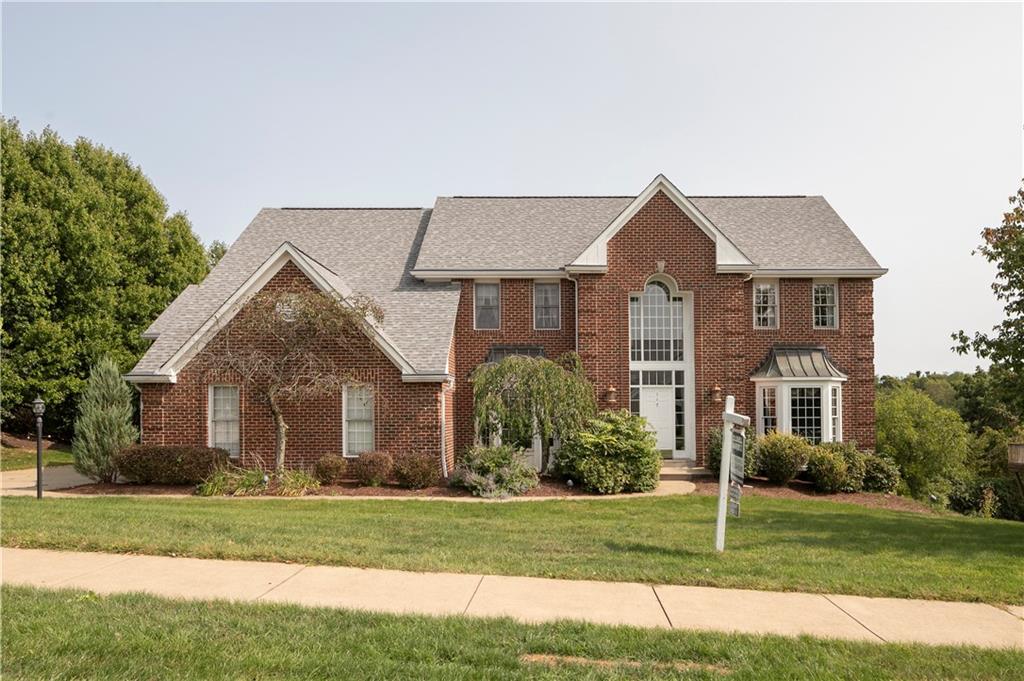 117 Olde Manor Lane Coraopolis, PA 15108 - Photo 2 of 23 a front view of a house with a yard