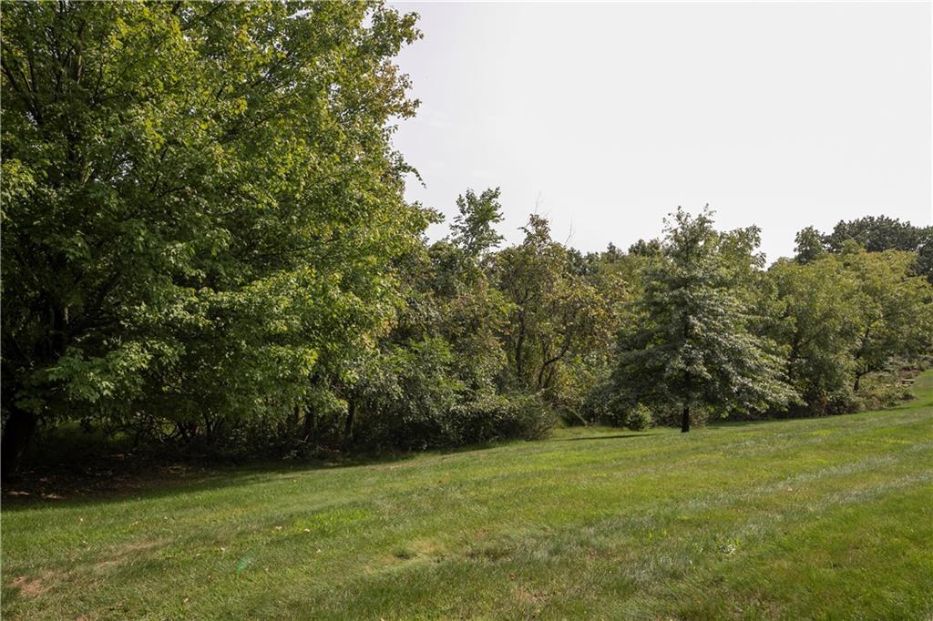 117 Olde Manor Lane Coraopolis, PA 15108 - Photo 22 of 23 a view of a field of grass and trees