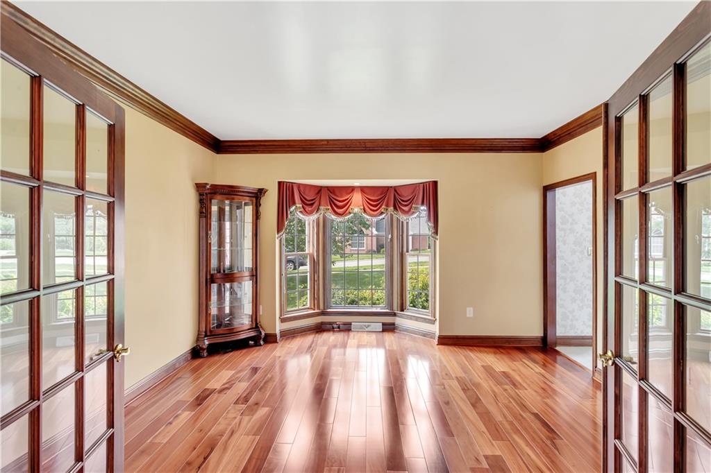 117 Olde Manor Lane Coraopolis, PA 15108 - Photo 5 of 23 a view of an empty room with a window