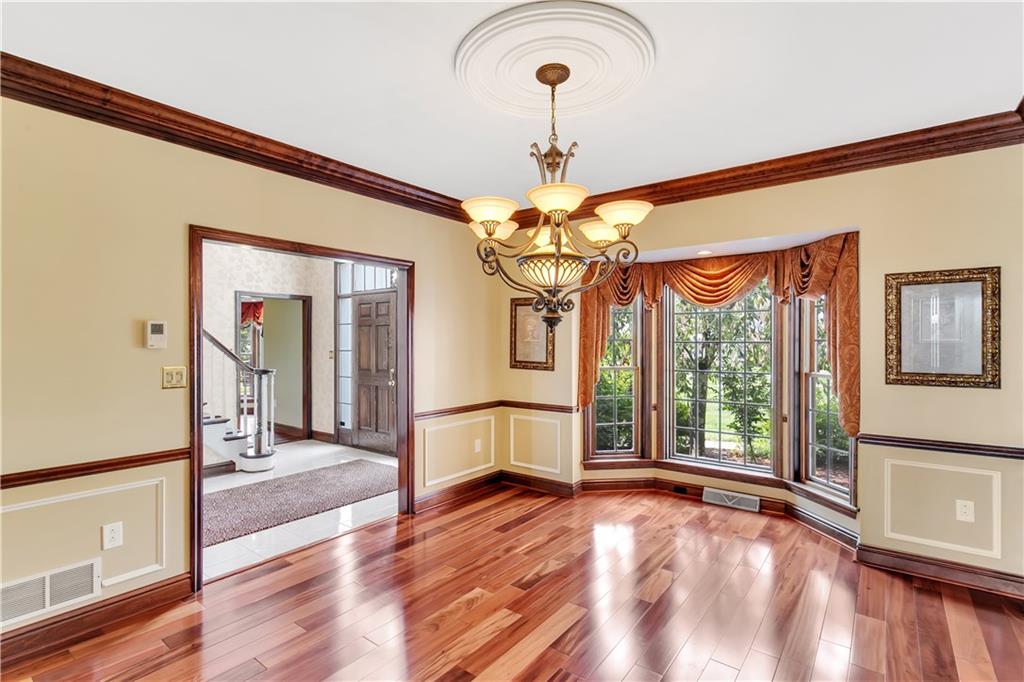 117 Olde Manor Lane Coraopolis, PA 15108 - Photo 6 of 23 a view of a room with window and wooden floor