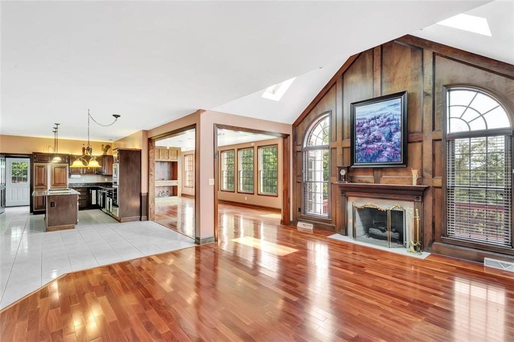 117 Olde Manor Lane Coraopolis, PA 15108 - Photo 8 of 23 a view of a livingroom with furniture and a fireplace