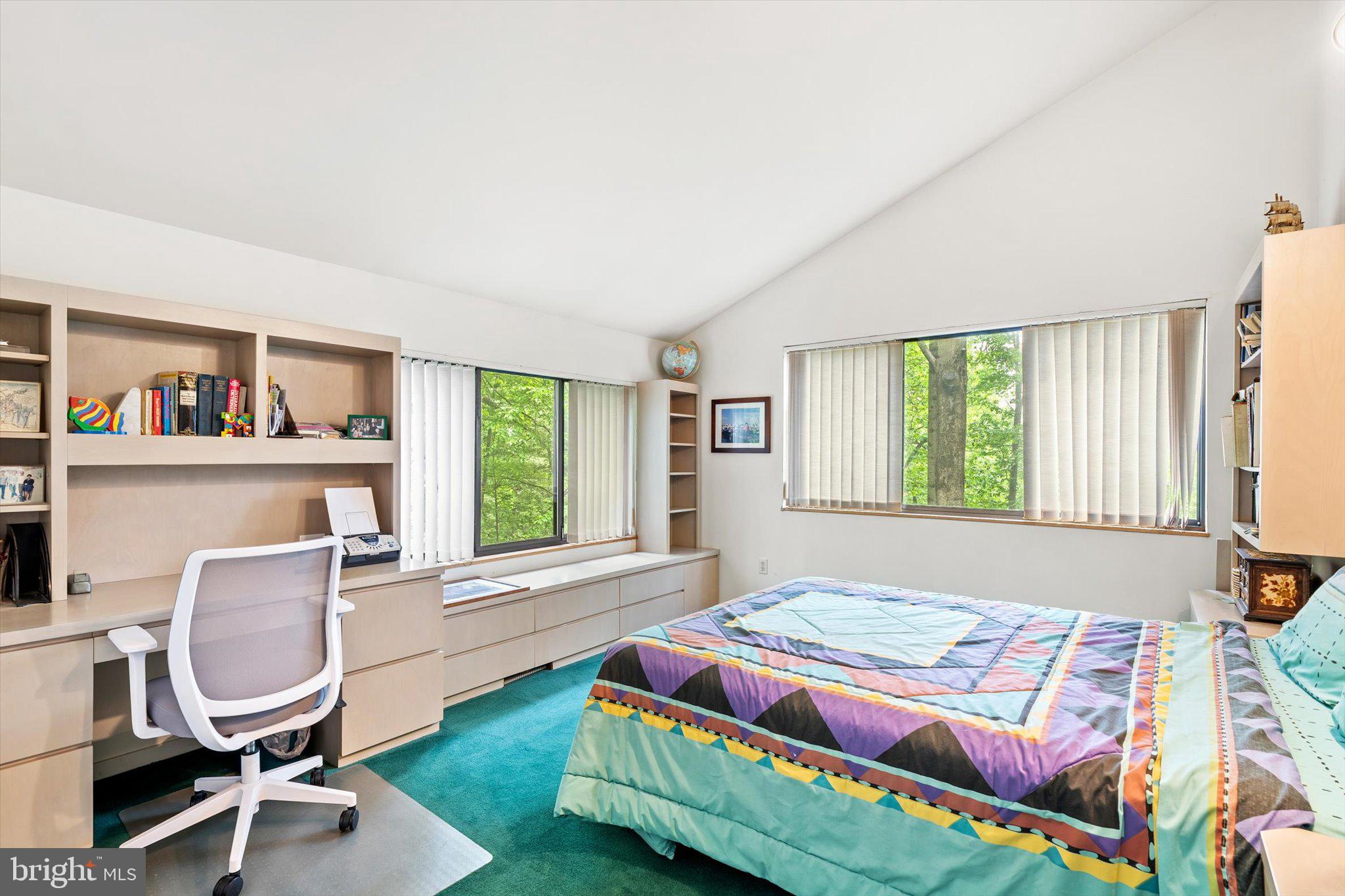 1163 Stuart Road Princeton, NJ 08540 - Photo 21 of 32 a bedroom with a bed chair and a large window