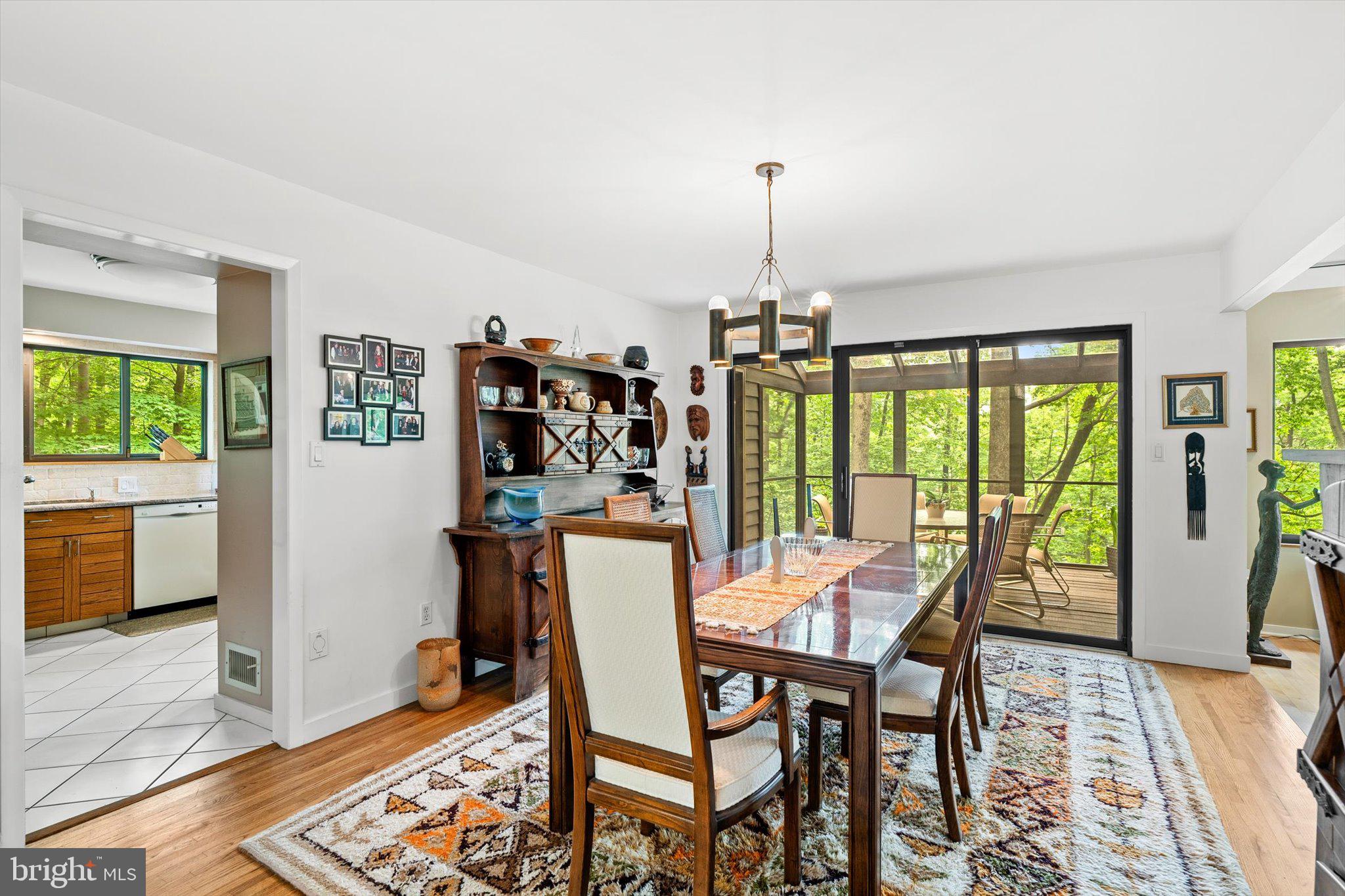 1163 Stuart Road Princeton, NJ 08540 - Photo 4 of 32 a view of a dining room with furniture window and wooden floor