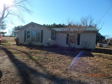 497 Revilo Road Leoma, TN 38468 - Photo 2 of 10 a view of a house with a yard