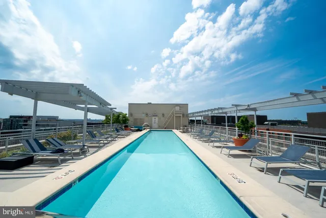 a view of a backyard with sitting area
