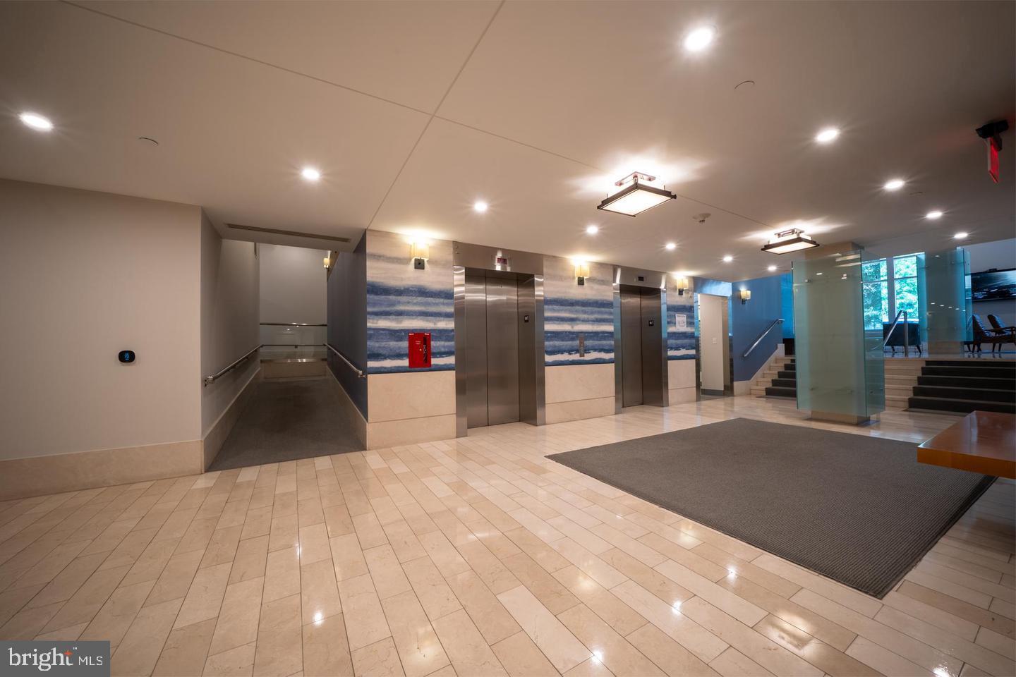 1025 First Street Southeast, Unit 611 Washington, DC 20003 - Photo 30 of 36 a view of a kitchen with a refrigerator and a microwave