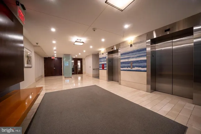 a view of a hall with wooden floor
